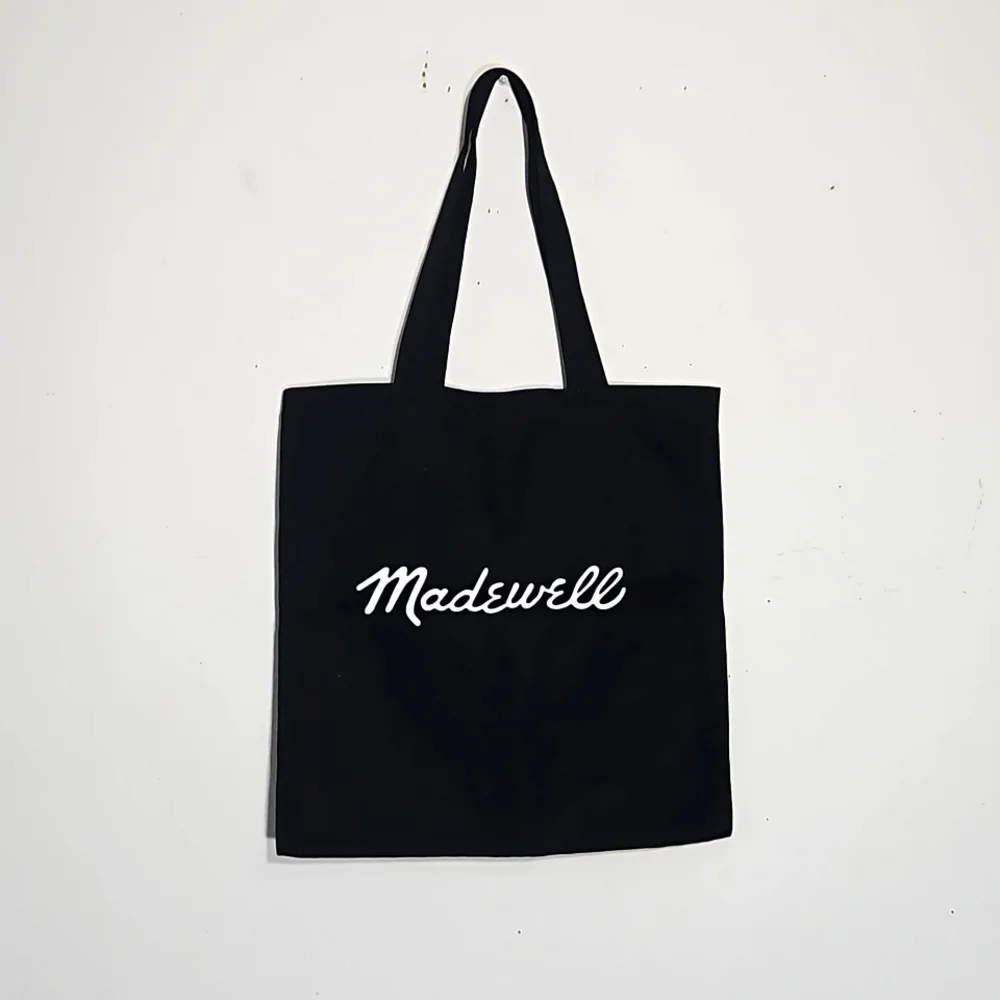 madewell bien fait 100% cotton black with white lettering thin tote